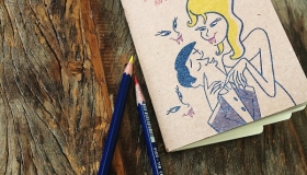 AtitAgain! BooksUpstairs Romping through Dracula notebook with colour pencils on wooden table
